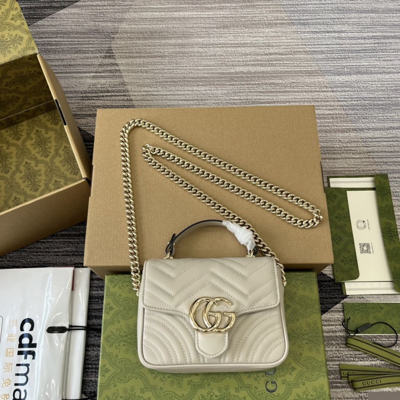 G*u*i top handle bags